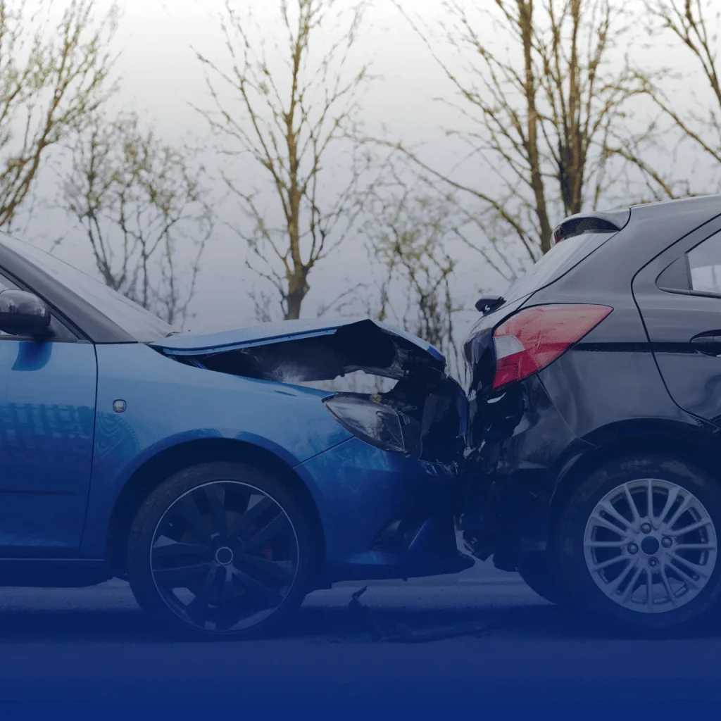 Blue car rear-ends black car on the road - Houston Black Personal Injury Lawyer